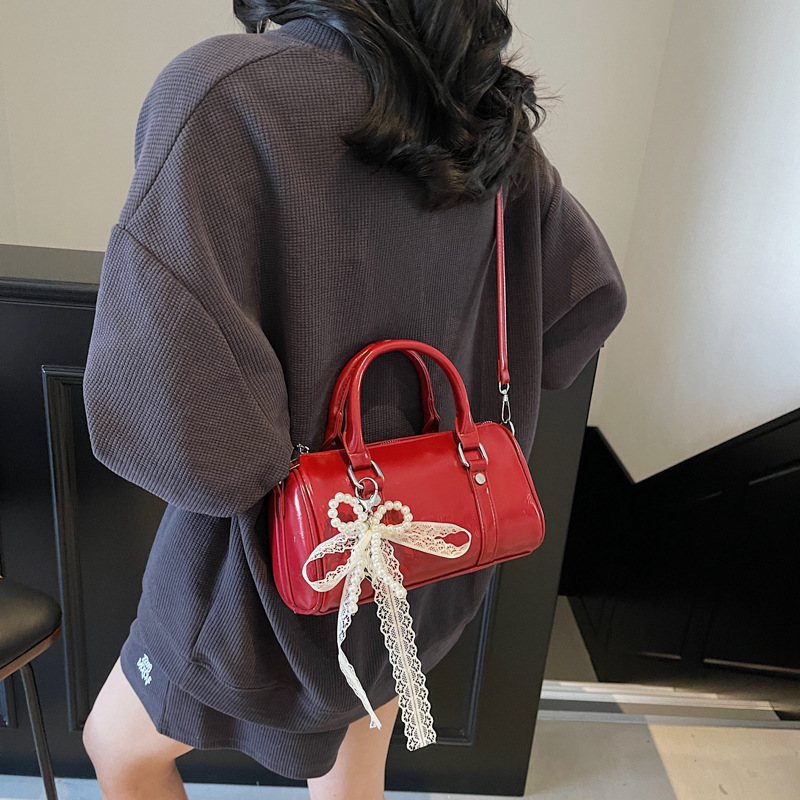 designer 2025 New Fashionable Elegant Versatile Handheld Cylinder Bag for Women Oil Wax Leather Commuter Crossbody Bag Solid Color Crossbody Bag