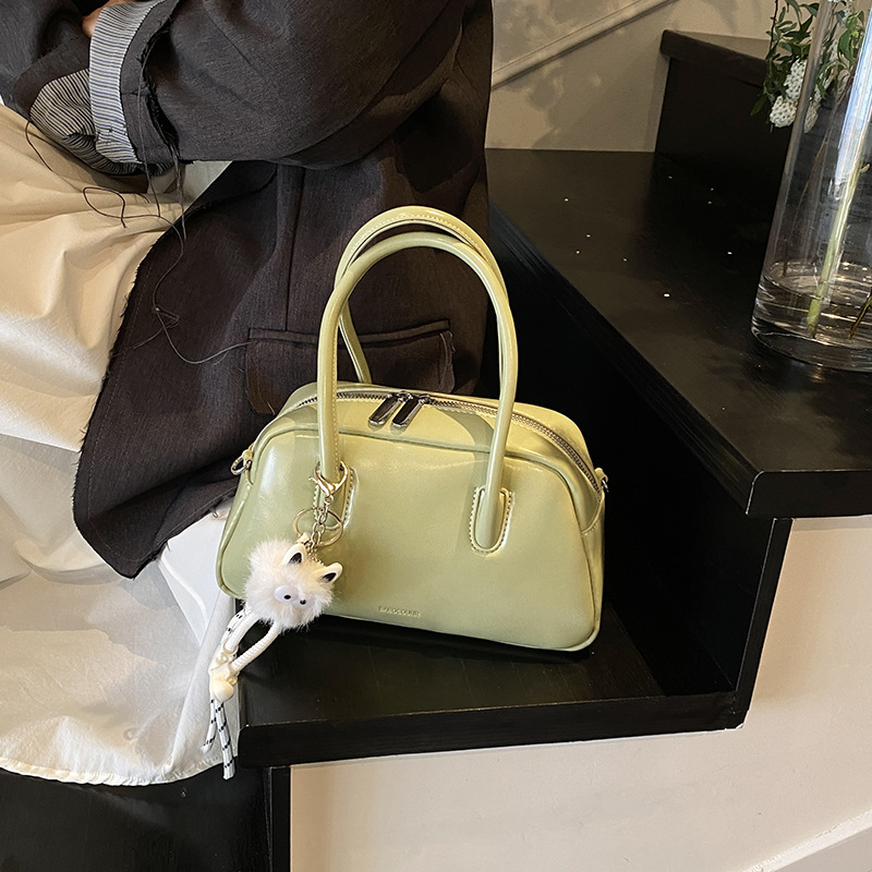 designer Korean Style Simple Handheld Bowling Ball Bag for Women 2025 New Casual Crossbody Bag Niche Commuter Shoulder Pillow Bag