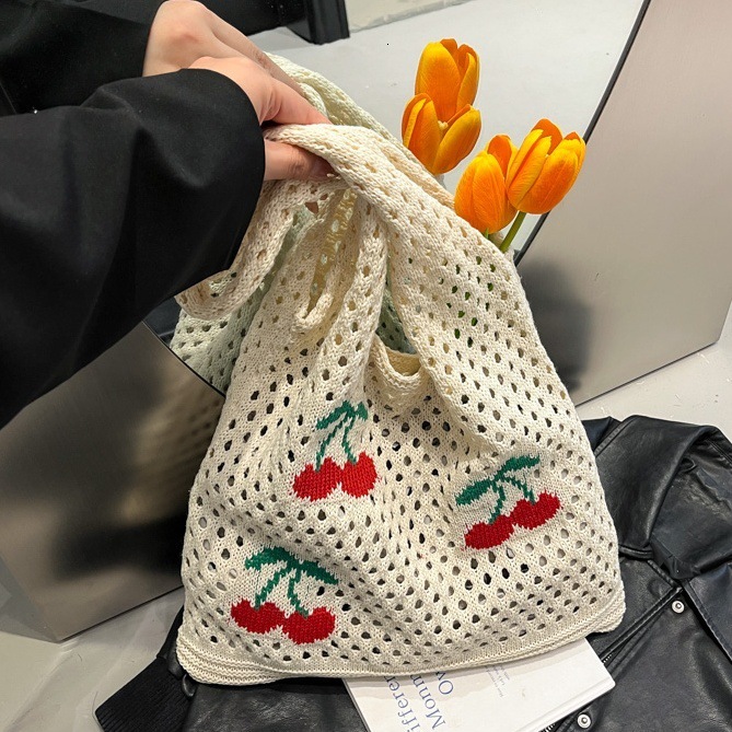 designer casual bag 2025 New Embroidered Women's Shoulder Bag Commuter Large Capacity Bag Knitted Bag Women's Woven Hollow Bag