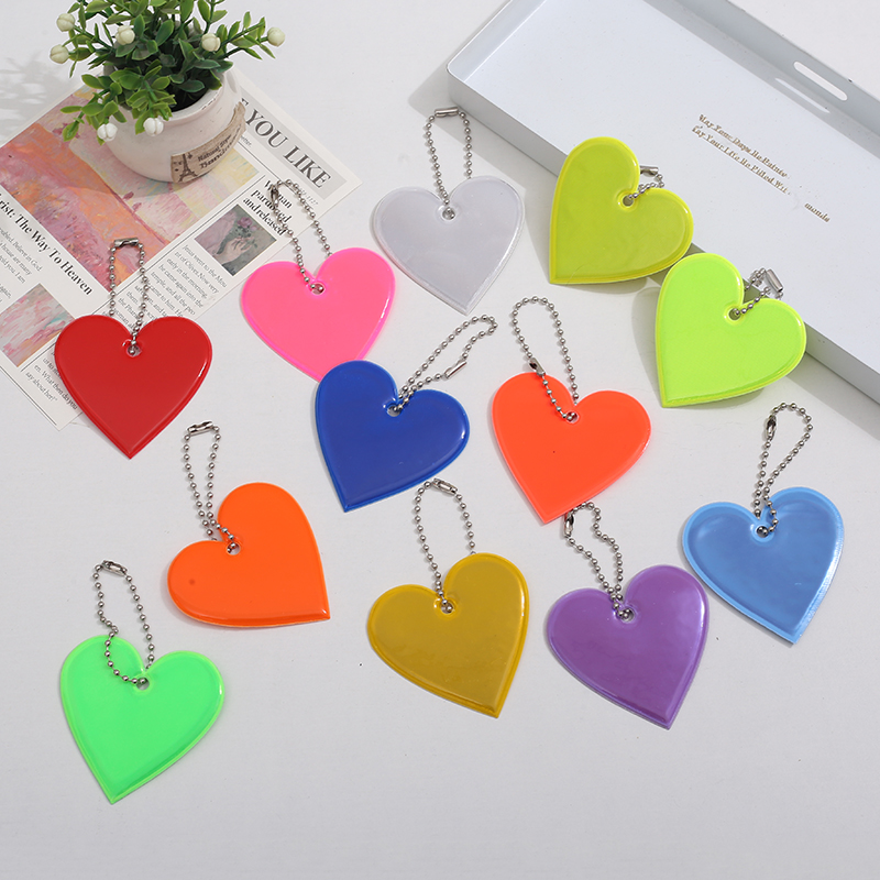 Creative Reflective Pendant for Backpacks - Safe Travel at Night with Multicolor PVC Glow-In-The-Dark Design