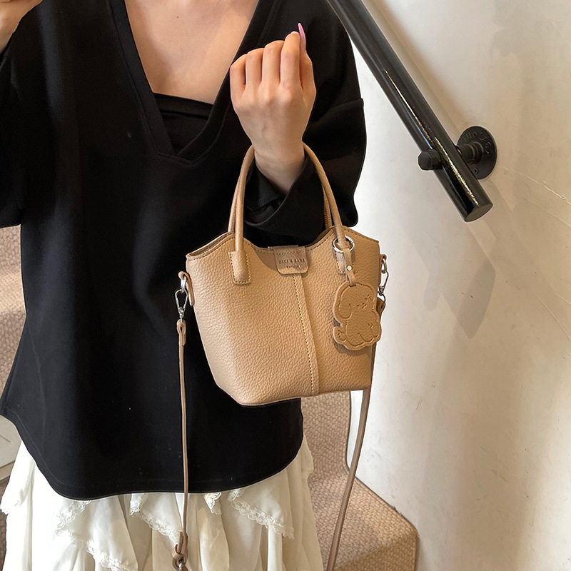 designer Niche Handheld Basket Bag for Women 2025 New Fashion Bucket Bag Simple Versatile Handheld Shoulder Crossbody Bag