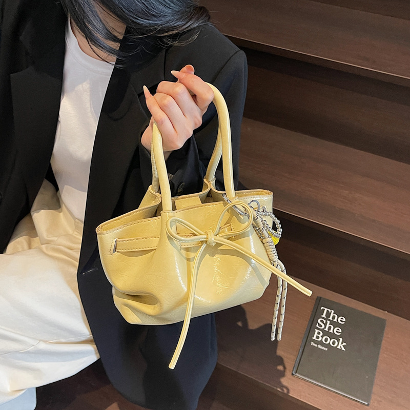 designer Korean Niche Handheld Basket Bag for Women Spring Summer 2025 New Trendy Fashion Bucket Bag with Bowknot Crossbody Bag