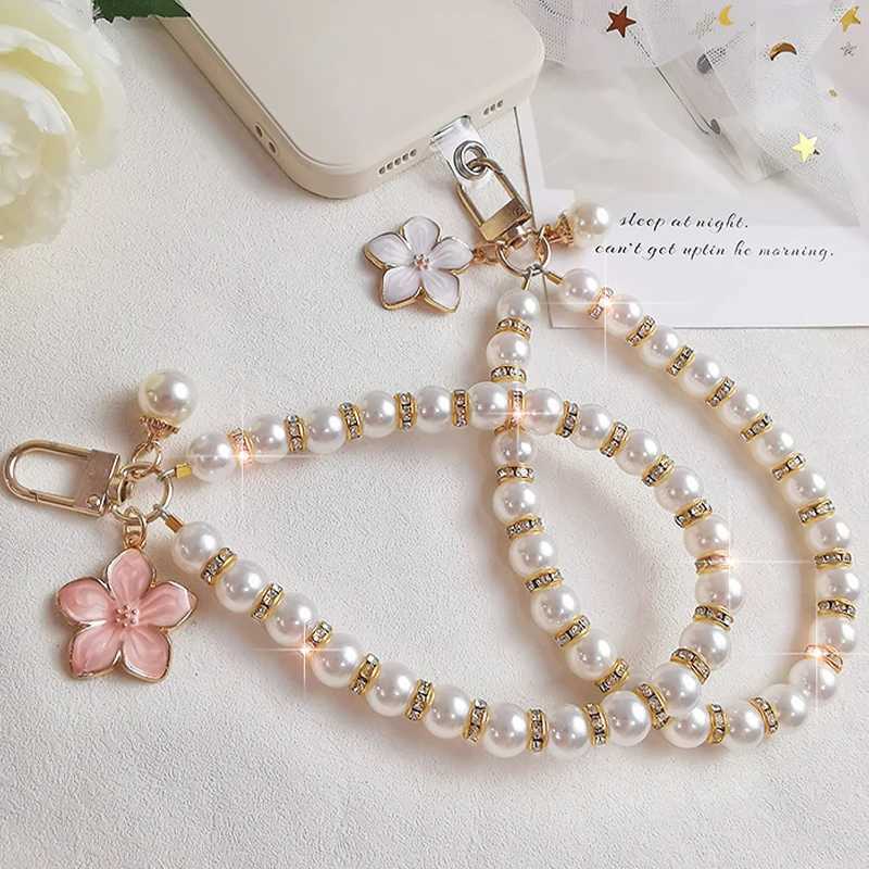 2024 Pearl Keychain Luxury Women Jewelry Shiny Pearl Bead Shell Phone Bag Backpack Charm Accessory Car Key Chain Pendant W250604