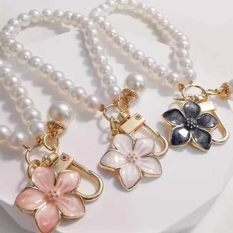 2024 Pearl Keychain Luxury Women Jewelry Shiny Pearl Bead Shell Phone Bag Backpack Charm Accessory Car Key Chain Pendant W250604