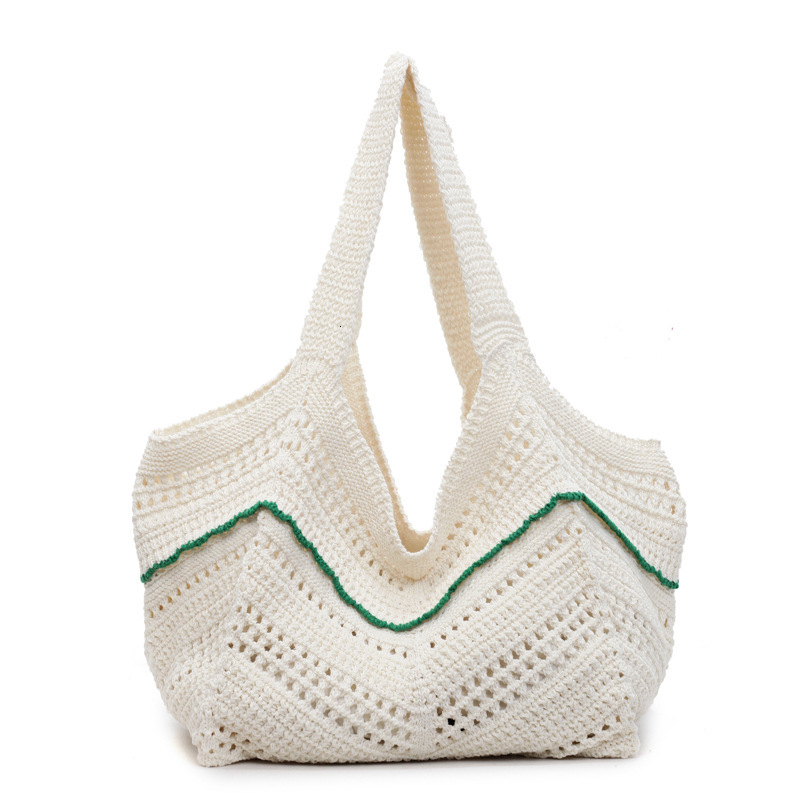 designer Knitted Bag for Women 2025 New Knitted Hollow Shoulder Tote Bag Lazy Style Beach Vacation Bag