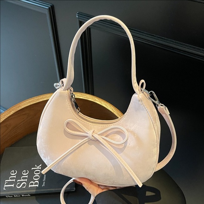 designer Minimalist Solid Color Bowknot Handheld Dumpling Bag for Women 2025 Summer New Casual Fashion Versatile Underarm Shoulder Bag