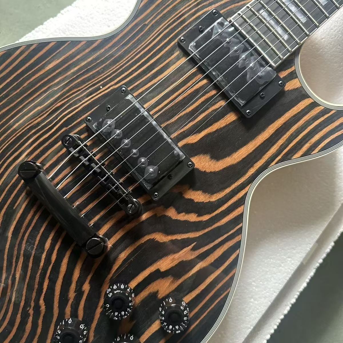 Artistically Tailored Zebra-Themed Electric Instruments from Master Craftspeople