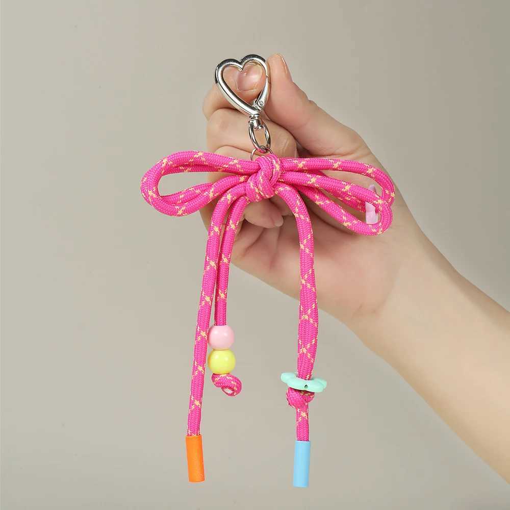 2025 Fashion New Colorful Hand Woven Bow Keychain Charming Heart Buckle Ring Small Flower Bead Bag Keychain Accessory W250604