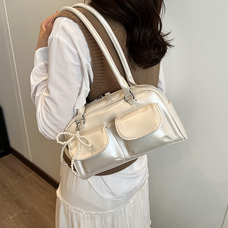 Korean style niche design fashion armpit Boston bag new popular handheld bowling bag large fashion capacity shoulder bag designer women s crossbody ba
