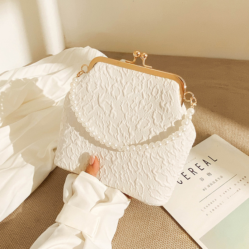 Top quality Brand High Quality New Style Phone Bag 2025 New Cloud Cheongsam Women's Bag Pearl Chain Crossbody Bag Gold Makeup Bag New Free Delive