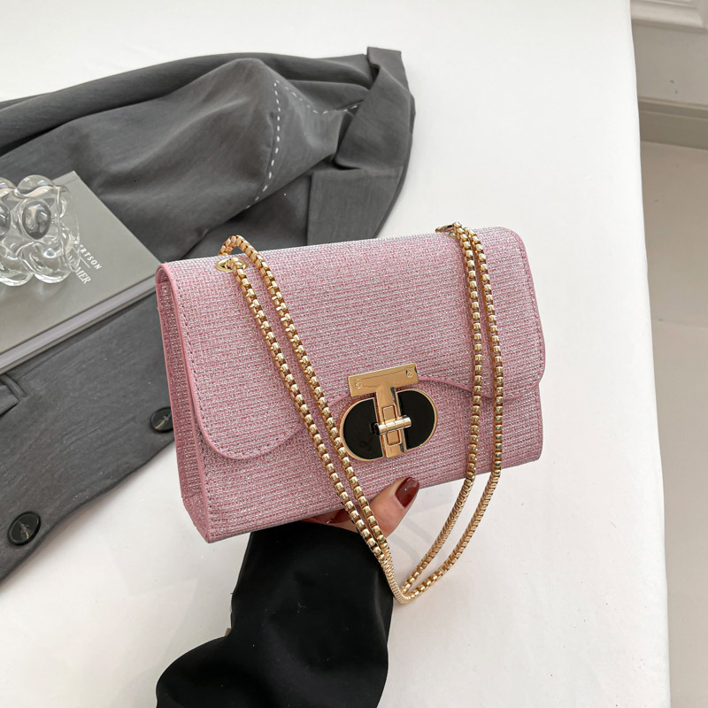 Top brand high-quality new free designer bag fashion chain bag 2025 new lock single shoulder crossover water ripple texture armpit bag brand new free 