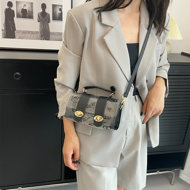 Top brand high-quality new free designer bag transparent jelly pouch 2025 new PVC printed graffiti Cambridge bag beach crossbody bag brand new free de