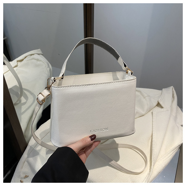 Top brand high-quality new free designer bag fashionable shoulder letter embossed elegant handbag 2025 new horizontal bucket small bag new free design