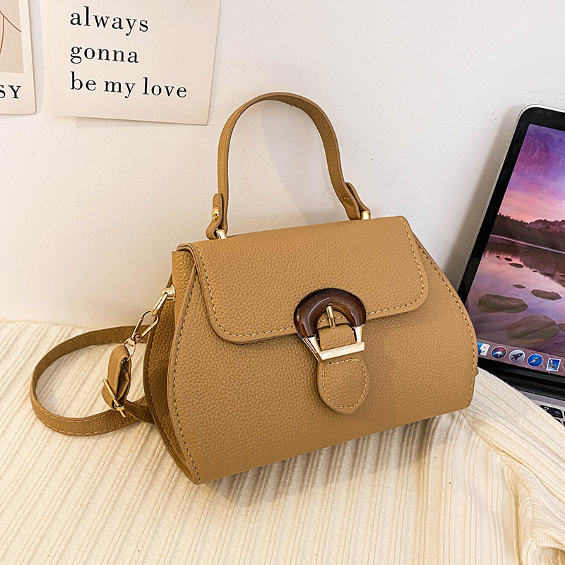 High quality brand new high-quality free designer bag new lychee texture fashionable and simple handbag shoulder width style new free designer bag
