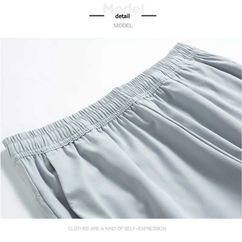 Summer high-quality ice silk quick-drying sportswear and casual shorts elastic ice-like capri pants loose large-sized pantsXJ250605