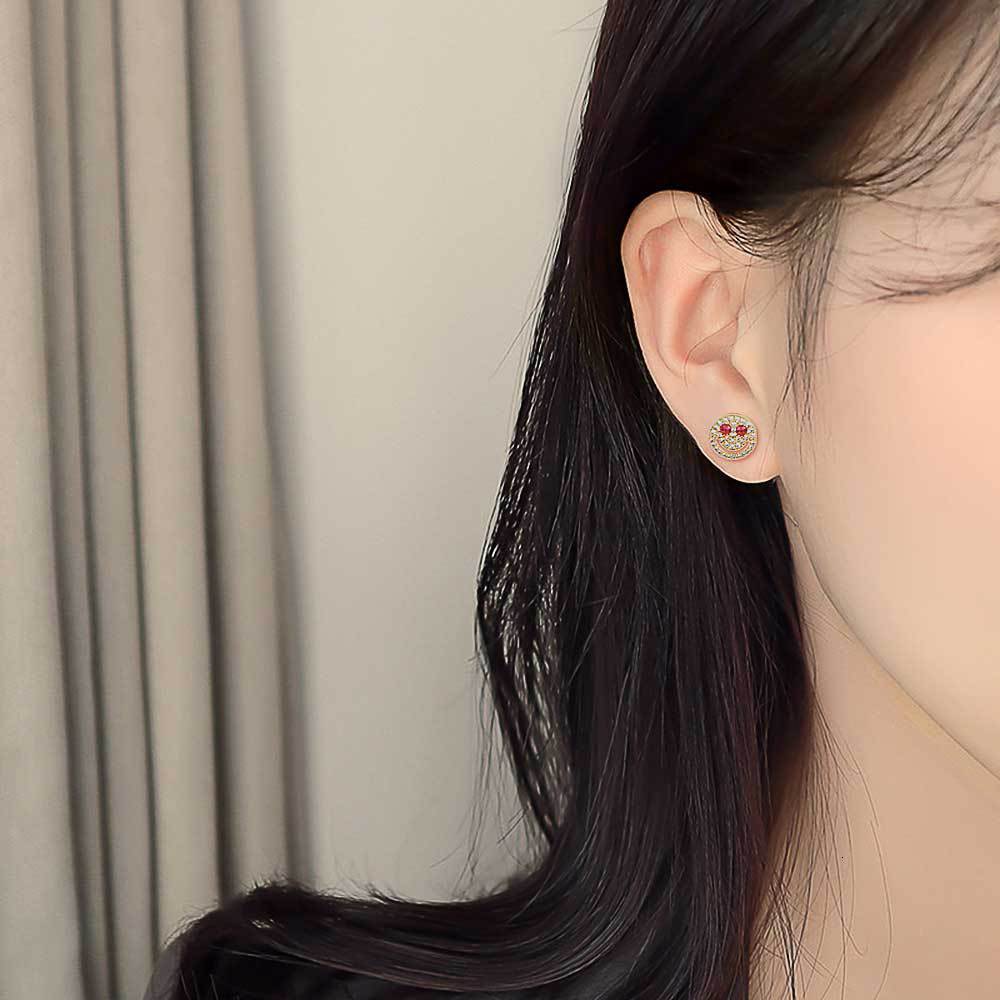Hip hop inlaid with Moissanite smiling face Earrings personality eyefun real gold electroplating 925 silver needle Earrings