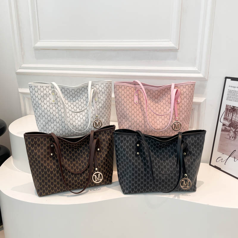 Bag Women 2025 New PU Large Capacity Commuter Storage Shoulder Bag Foreign Style Fashion Shopping Hand Bag Tide tote bag Designer bag