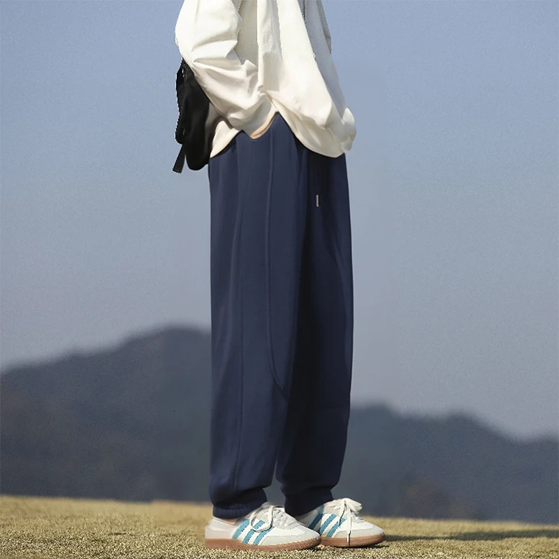 Spring and Autumn mens fashion casual pants men loose drawstring Hong Kong version of sweat 250605Z