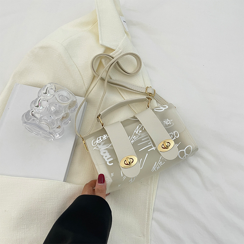 Top brand high-quality new free designer bag transparent jelly pouch 2025 new PVC printed graffiti Cambridge bag beach crossbody bag brand new free de