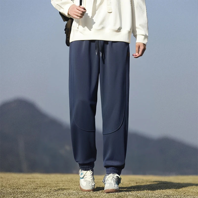 Spring and Autumn mens fashion casual pants men loose drawstring Hong Kong version of sweat 250605Z