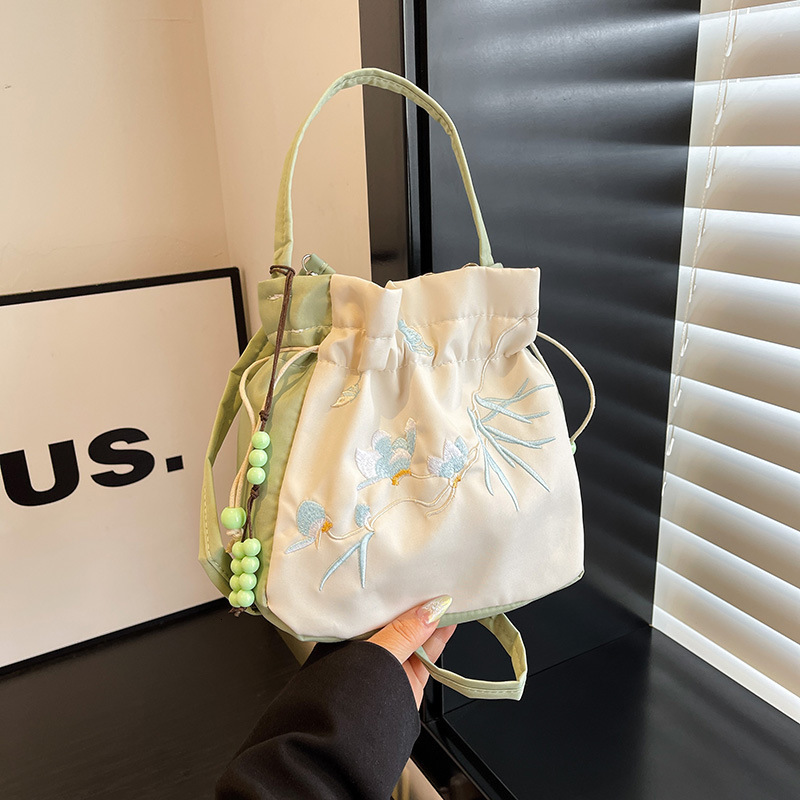 New Chinese ancient embroidery fashion trend niche multifunctional women's slanted shoulder handbag designer shoulder bag