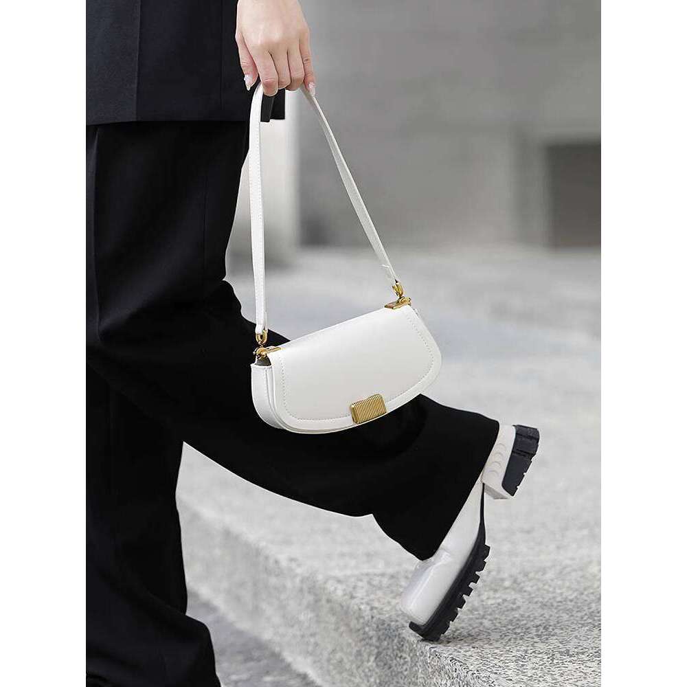 High-End Luxury Niche Black Underarm Women 2025 New Commuter Shoulder Crossbody Saddle Bag for Summer