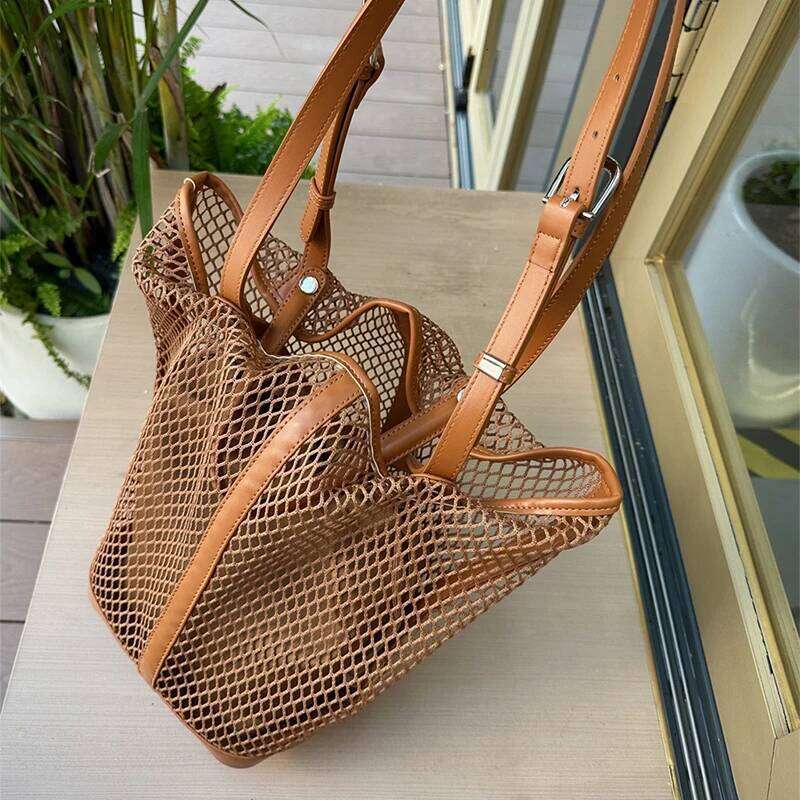 Brand Hand woven Large Capacity Vegetable Handbag Hollow Mesh Summer Beach Vacation Shopping Mother child Net Shoulder Bag