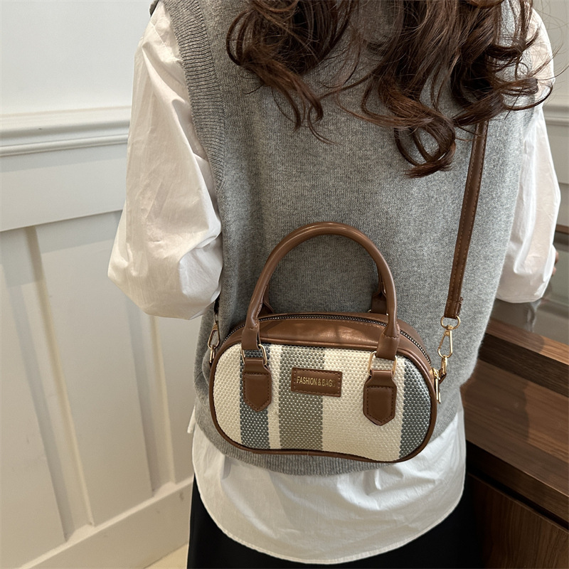 Top quality brand high-quality new free designer bag 2025 new simple texture retro striped color handbag shoulder width new free designer bag