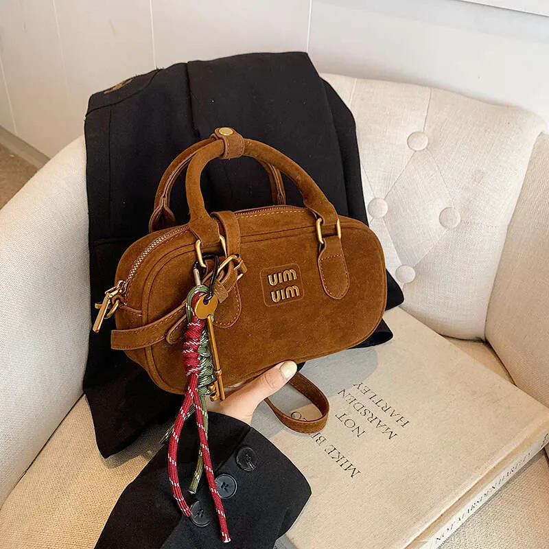 Spring, summer, autumn, and winterss frosted bowling bag for women's new fashion, versatile crossbody bag, super popular handbag