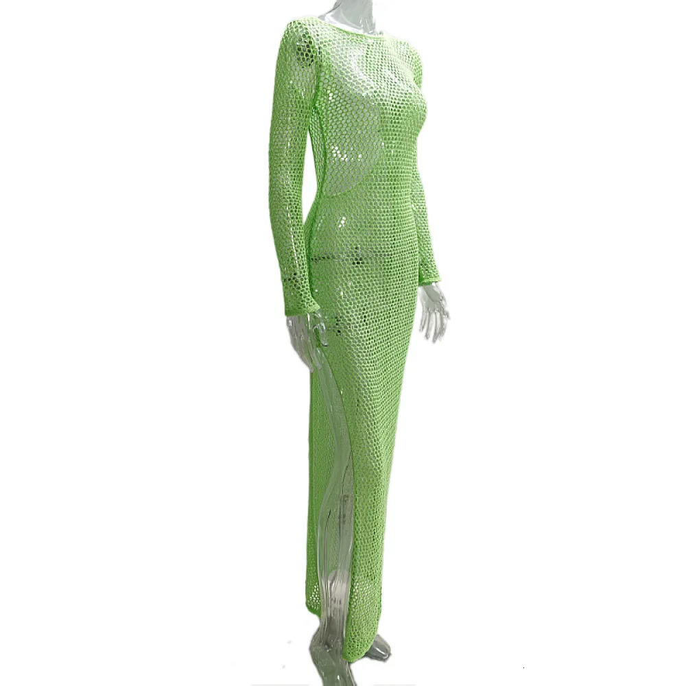 SpringSummer European and American womens wear sexy cutout seethrough vacation solidcolor backless knitted long dress 250604