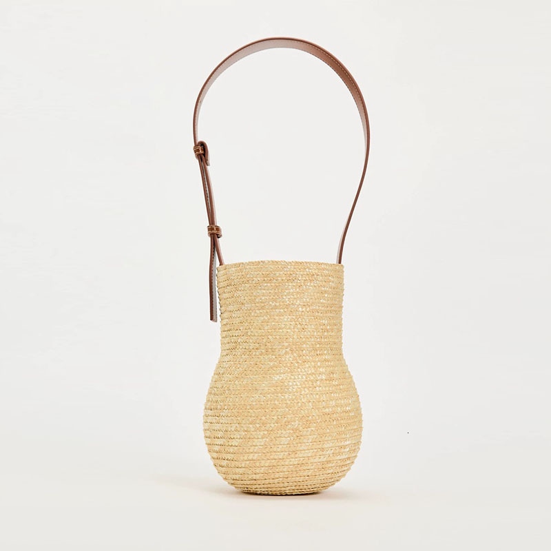 New Hulu One Shoulder Straw Bag Fashion Handheld Wheat Straw Hand woven Bag Resort Style Beach Bag Designer Multi functional Women's Bag