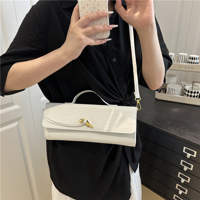 designer 2025 Summer Casual Simple Texture Baguette Bag Personality Trend Fashion New Stylish Women's Shoulder Crossbody Bag