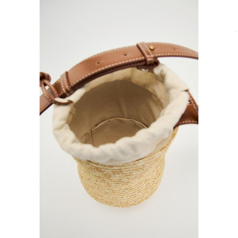 New Hulu One Shoulder Straw Bag Fashion Handheld Wheat Straw Hand woven Bag Resort Style Beach Bag Designer Multi functional Women's Bag