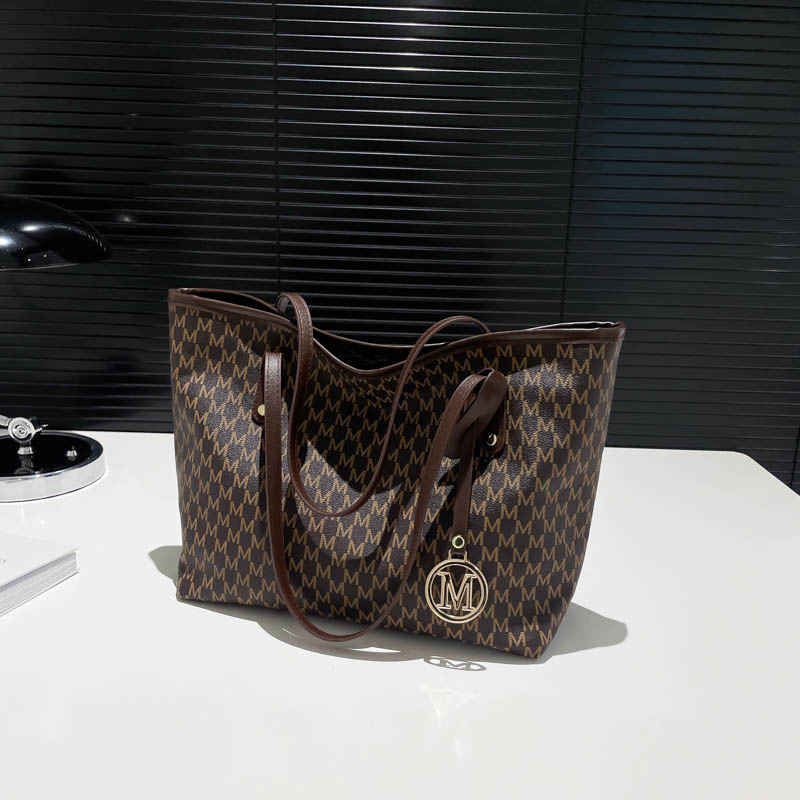 Bag Women 2025 New PU Large Capacity Commuter Storage Shoulder Bag Foreign Style Fashion Shopping Hand Bag Tide tote bag Designer bag