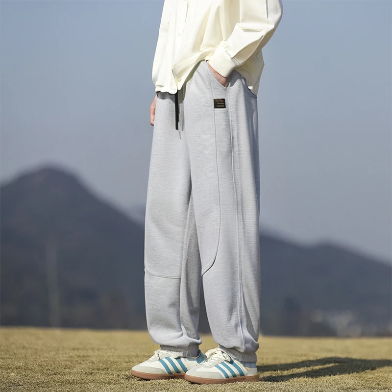 Spring and Autumn mens fashion casual pants men loose drawstring Hong Kong version of sweat 250605Z