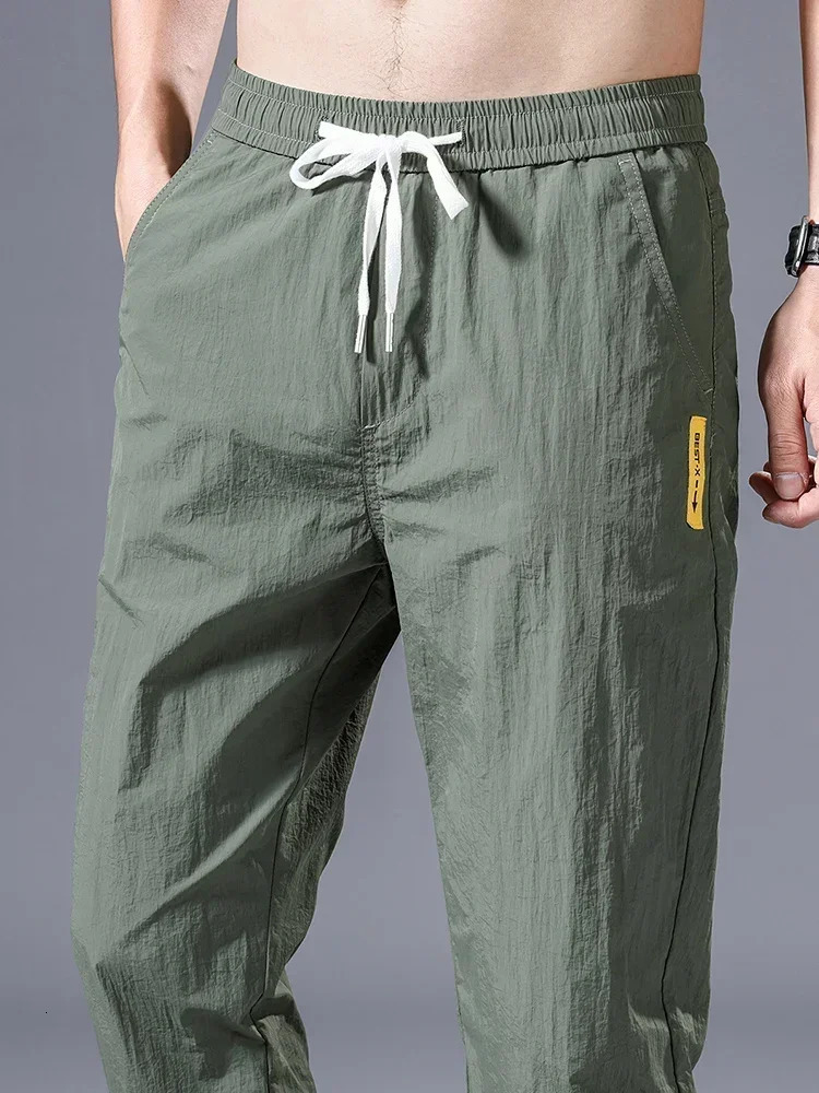 Summer Thin Men Casual Pants Ice Silk Breathable Korean Fashion Jogging Sweatpant Drawstring Bound Feet Ankle Length 250605Z