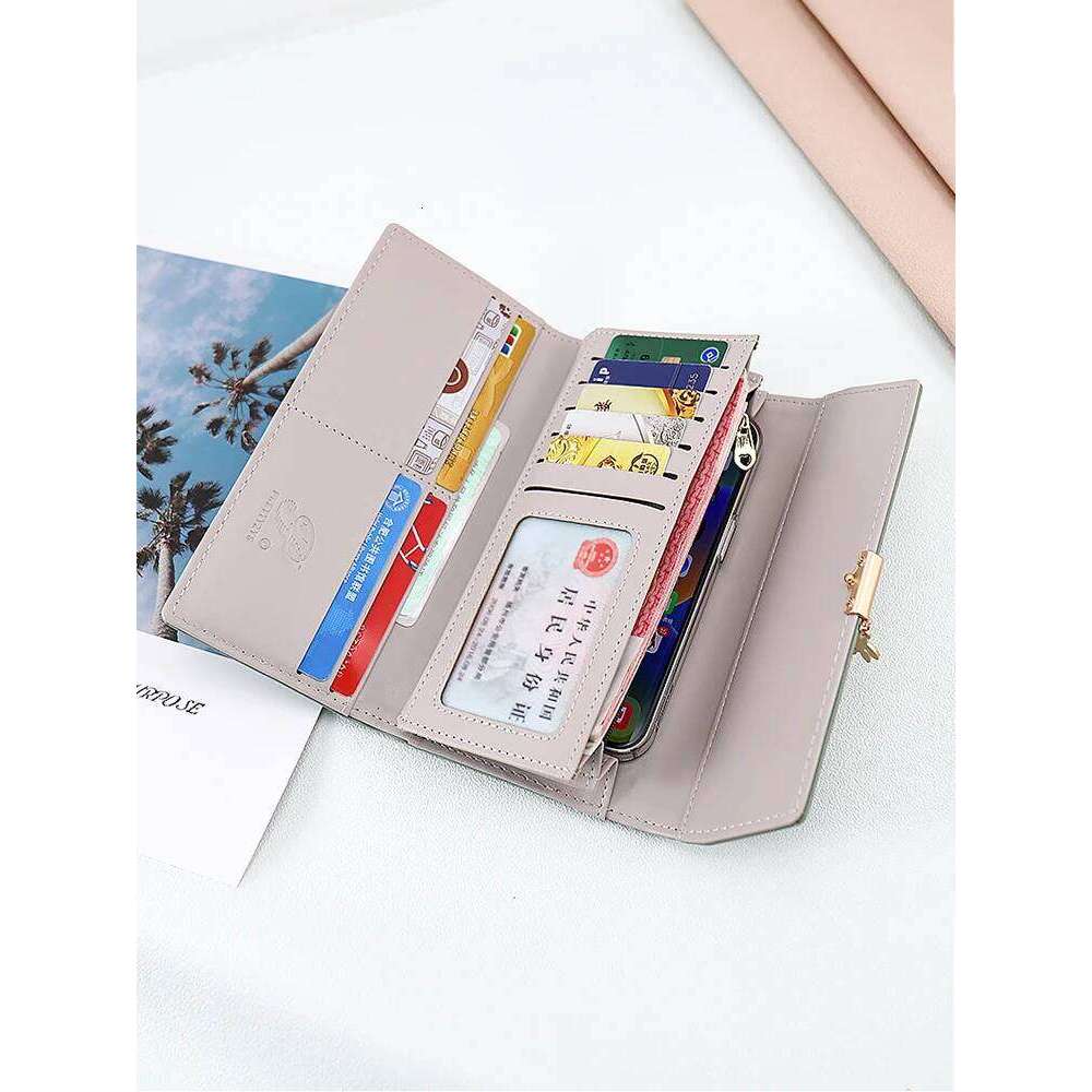 summer new Korean version of high texture PU Dia lattice personality leaf pendant three fold bag multi-card can be expa