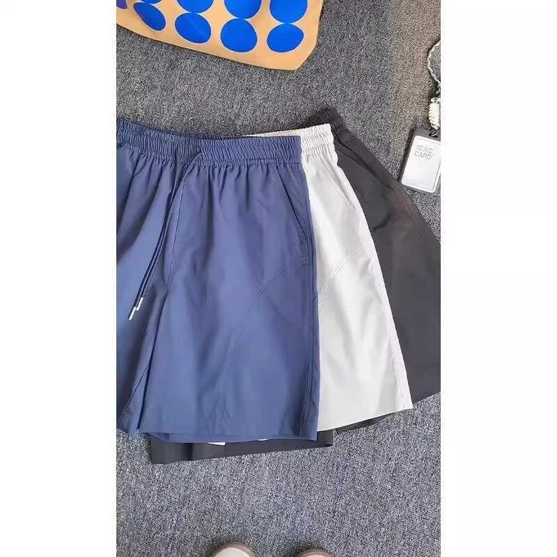 white Diagonal Cut Casual Shorts Mens Summer Ice Silk Quick-drying Charge Pants Over The Knee 45-minute Medium Pants XJ250605