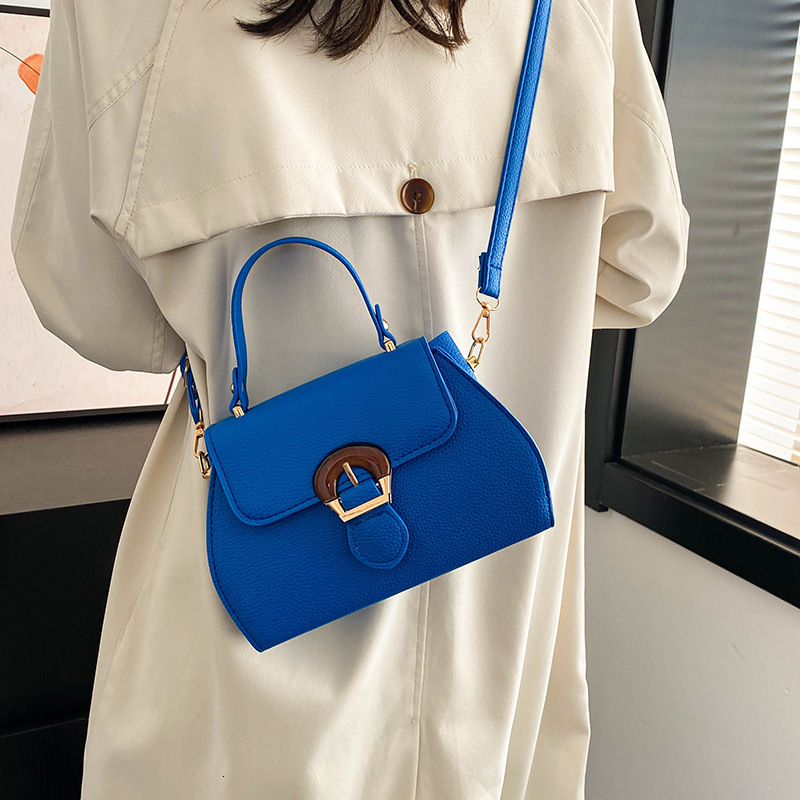 High quality brand new high-quality free designer bag new lychee texture fashionable and simple handbag shoulder width style new free designer bag