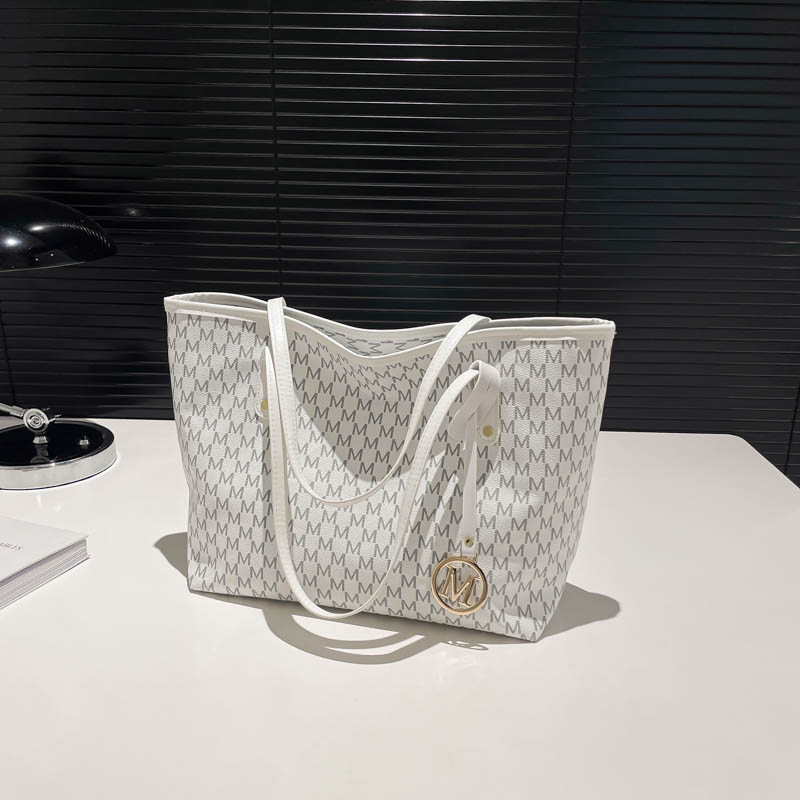 Bag Women 2025 New PU Large Capacity Commuter Storage Shoulder Bag Foreign Style Fashion Shopping Hand Bag Tide tote bag Designer bag