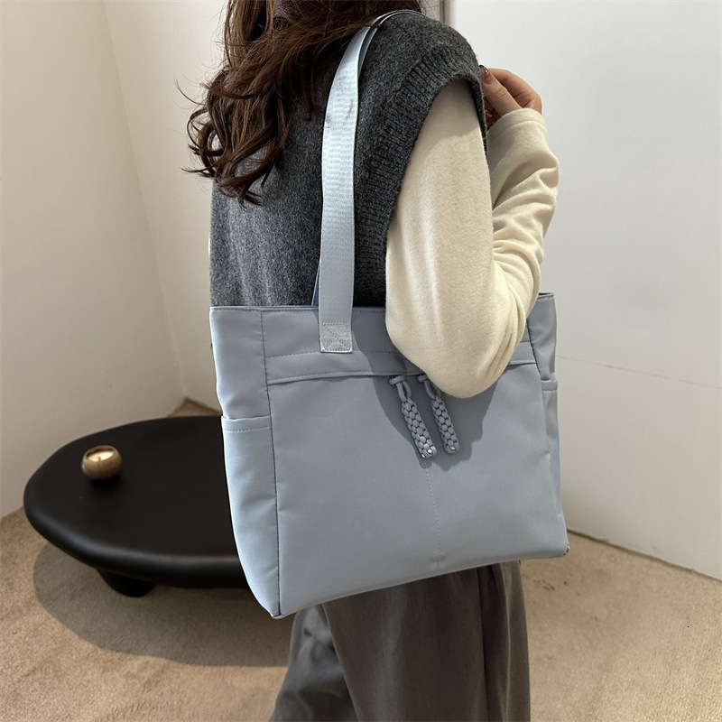 designer Minimalist Korean Style Large Capacity Commuter Tote Bag 2025 Winter New Lightweight Fashion Casual Shoulder Underarm Women's Bag