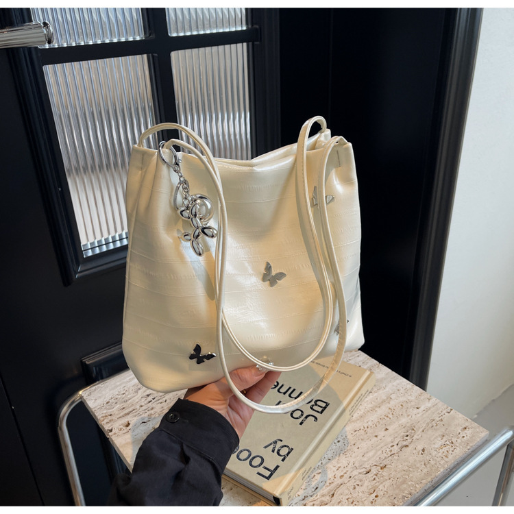 Top Brand High Quality New Style New Model Available Versatile Casual Simple Fashion Sense Butterfly Style Tote Shoulder Bag for Women New Free Delive