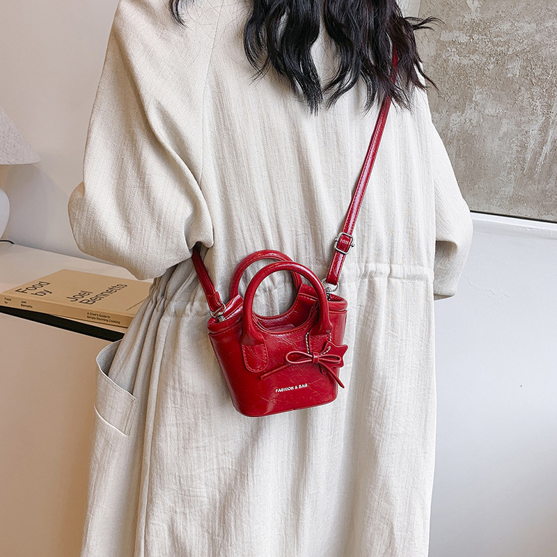 Korean style fashion solid color women's shoulder bag fashion mini cute pendant bag designer women's shoulder bag crossbody bag