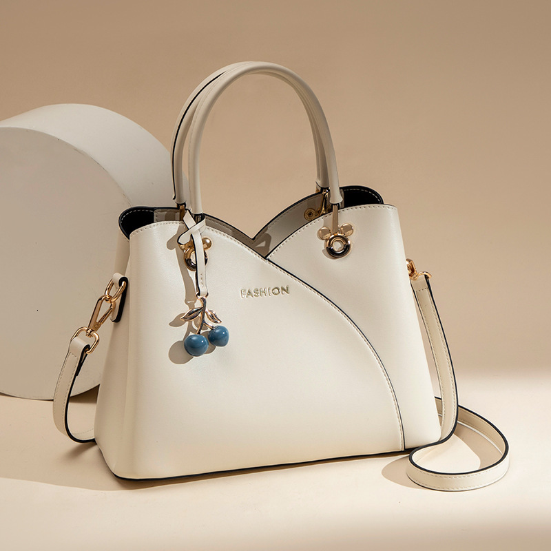 Top brand high-quality new free designer bag women's leather handbag fashionable large capacity high-quality women's bag new free designer b