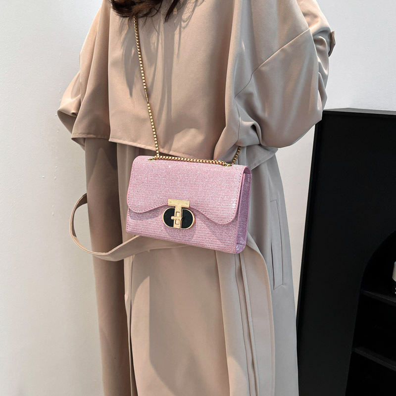 Top brand high-quality new free designer bag fashion chain bag 2025 new lock single shoulder crossover water ripple texture armpit bag brand new free 