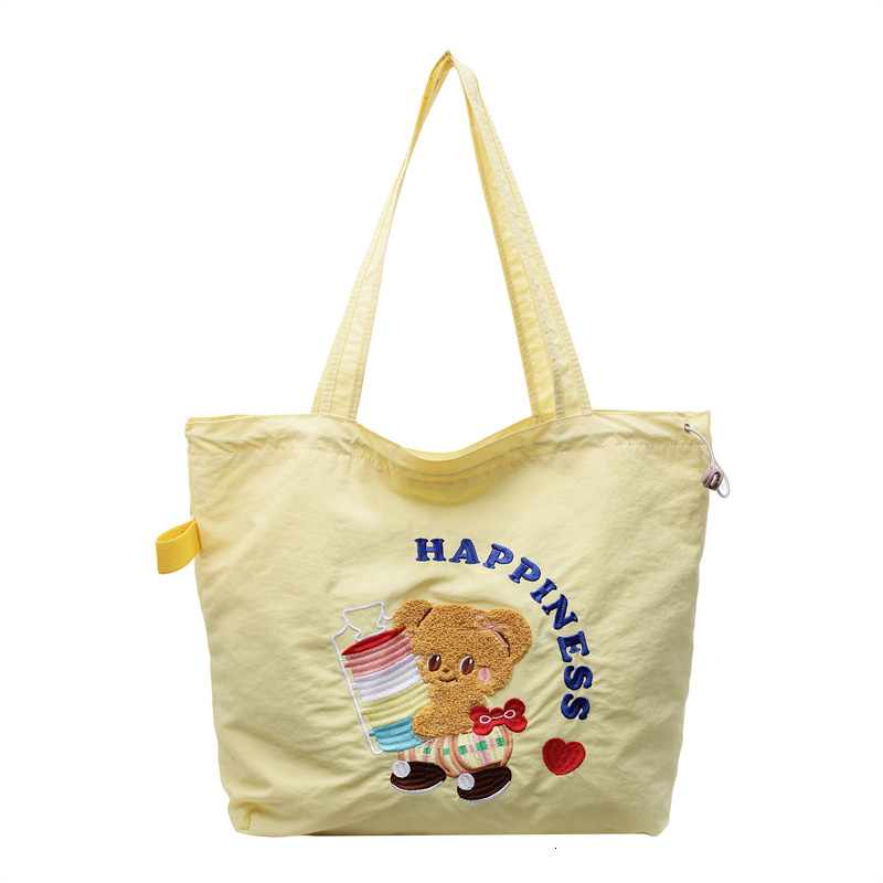 designer 2025 New Cartoon Canvas Bag Large Capacity Student Class Commuter Shoulder Bag Casual Versatile Handheld Tote Bag