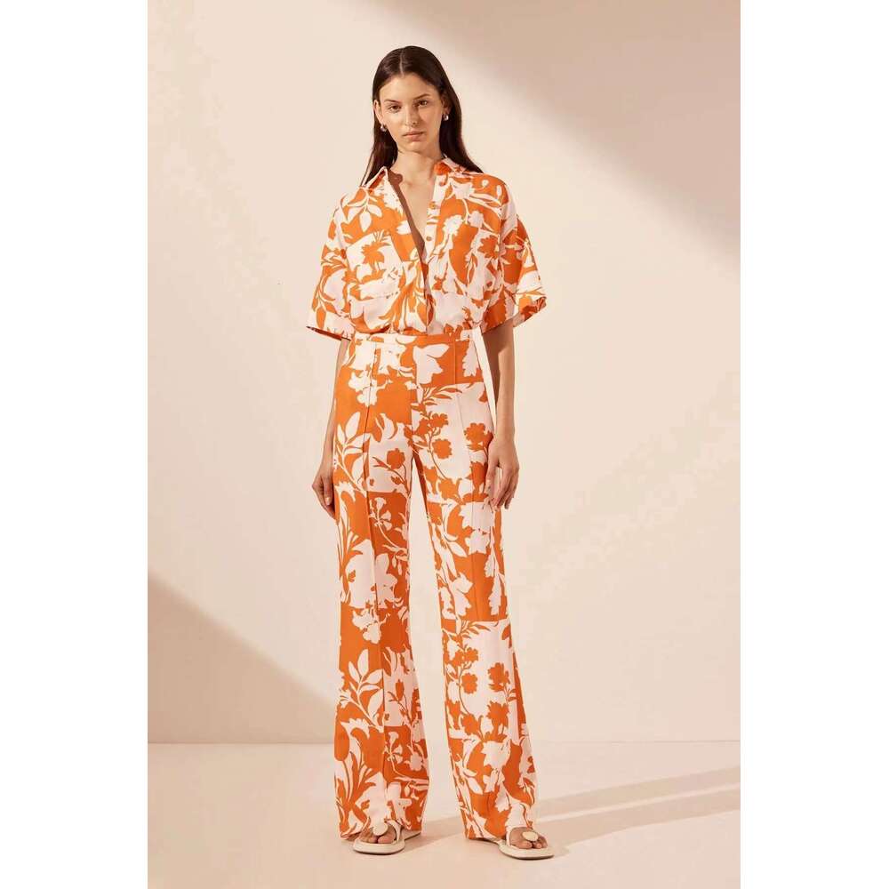 Women's New Fashion Casual Geometric Print Pocket Top Cardigan Flared Pants Set B5