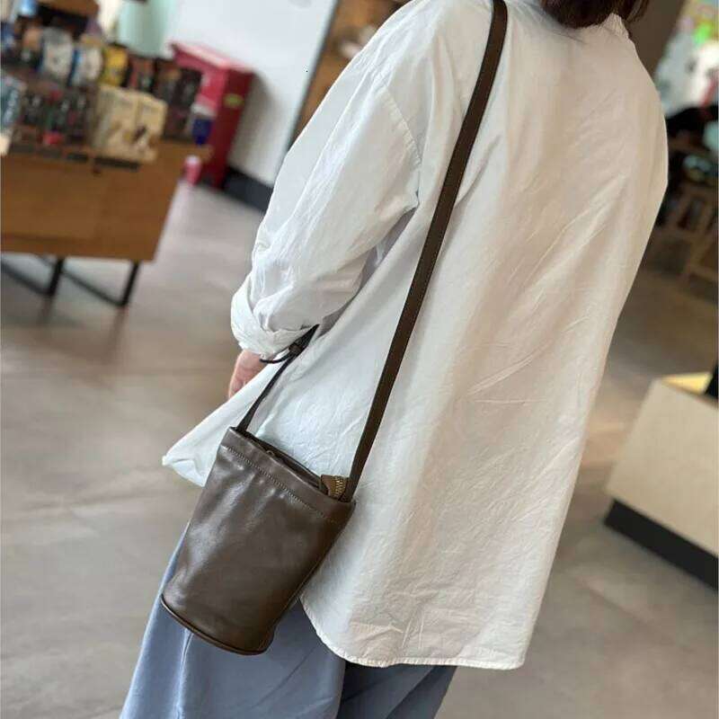 Johnature Casual Women's Mini Bag 2025 New Simple Solid Color Genuine Leather Versatile Small Bucket Shoulder & Crossbody Bags 2025/06/05