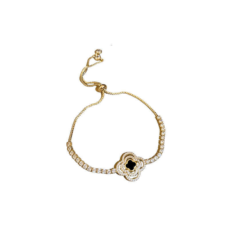 Luxury jewelry designer clover bracelet zircon diamond flower hollow bracelet, high-end design bracelet, personalized and cool style retro jewelry for