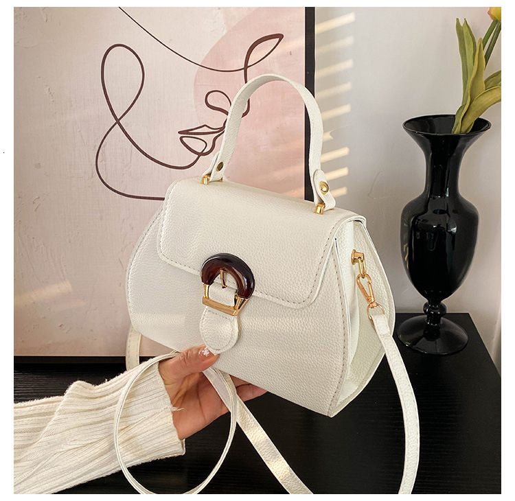 High quality brand new high-quality free designer bag new lychee texture fashionable and simple handbag shoulder width style new free designer bag